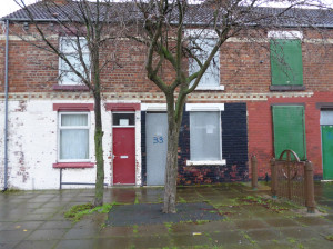 A red doored house used to house asylum seekers in Middlesbrough (© John Grayson)