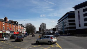 Hagley Road: pub and shops on the left and offices on the right (© Sue Conlan)