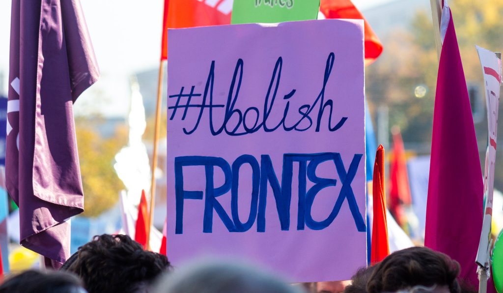 An Abolish Frontex placard at a demo in Germany
