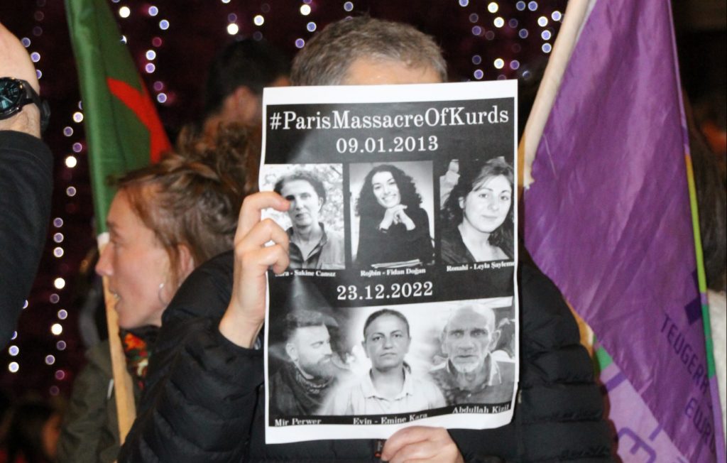 A poster commemorating the murder of Kurds in Paris, including the three women killed on 9 January 2013 and the three people on 23rd December 2022