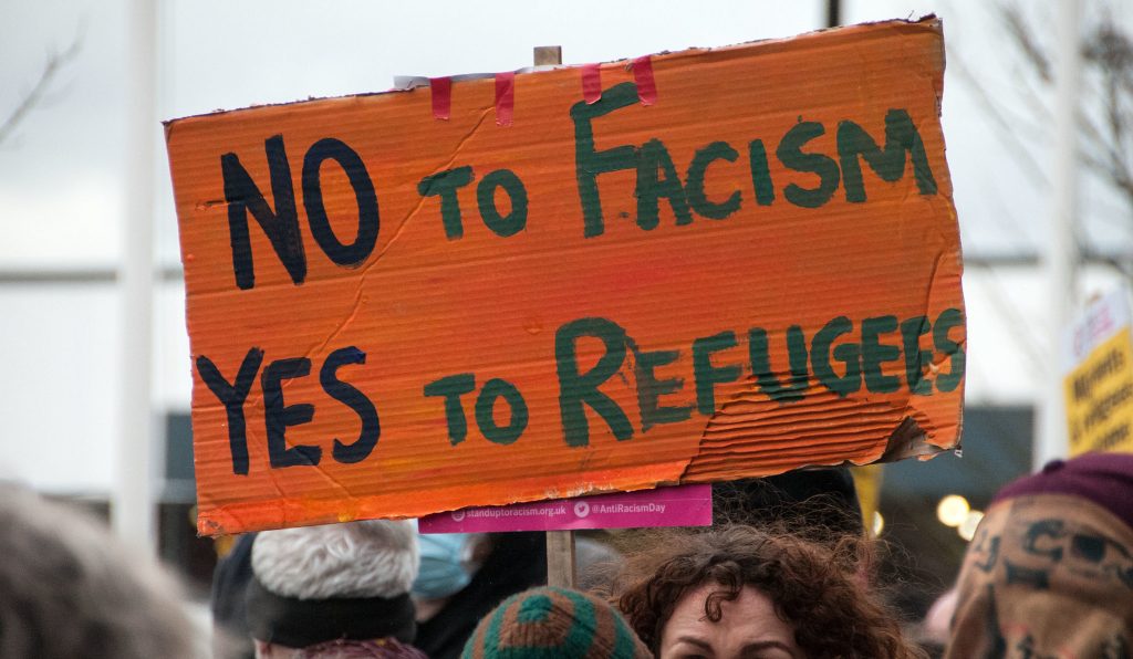 A banner saying No to Fascism Yes to Refugees at the counter-protest against a far-right demo outside an asylum seeker hotel in Rotherham.